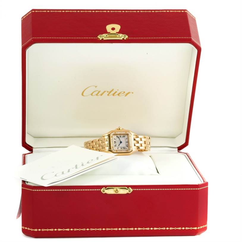The image shows a Cartier Panthere WF3070B9 Women's Yellow Gold Silver Dial WF3070B9 Women's Yellow Gold Silver Dial watch displayed inside its open red box, accompanied by paperwork.
