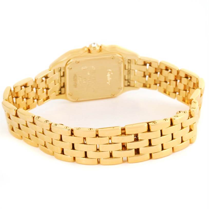 The image shows a Cartier Panthere WF3070B9 Women's Yellow Gold Silver Dial WF3070B9 Women's Yellow Gold Silver Dial watch from the back, highlighting its gold bracelet and caseback.