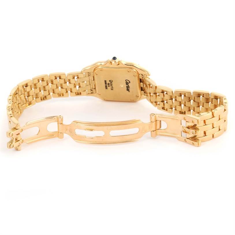 This image shows the open clasp and back side of the bracelet and case of a Cartier Panthere W25022B9 Women's Yellow Gold Silver Dial W25022B9 Women's Yellow Gold Silver Dial watch.