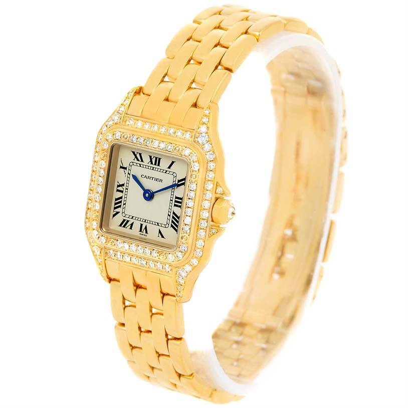 The Cartier Panthere WF3072B9 Women's Yellow Gold Silver Dial WF3072B9 Women's Yellow Gold Silver Dial model watch is shown at an angle highlighting its diamond-encrusted bezel, gold case, and bracelet.