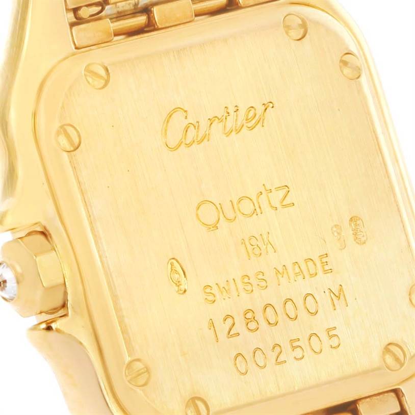 This image shows the backplate of a Cartier Panthere WF3072B9 Women's Yellow Gold Silver Dial WF3072B9 Women's Yellow Gold Silver Dial watch, highlighting its engravings and clasp mechanism.