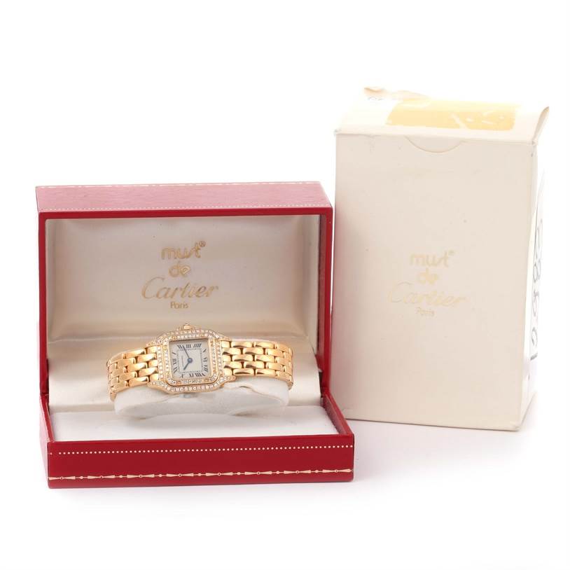 This image shows a Cartier Panthere WF3072B9 Women's Yellow Gold Silver Dial WF3072B9 Women's Yellow Gold Silver Dial watch in a red box with an ivory box beside it, all viewed from the front.