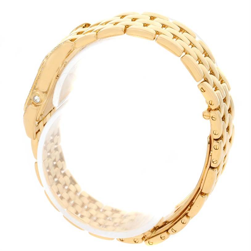 The image shows a close-up side view of the gold bracelet of the Cartier Panthere 128000 Women's Yellow Gold Champagne Dial 128000 Women's Yellow Gold Champagne Dial watch, highlighting its links and clasp.