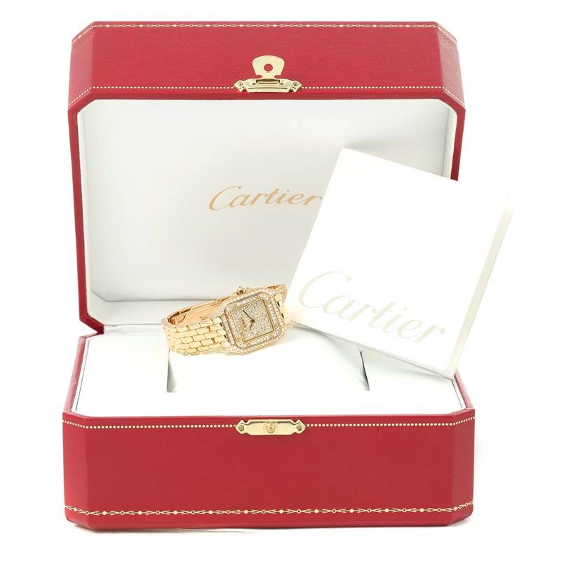 The image shows a Cartier Panthere 128000 Women's Yellow Gold Champagne Dial 128000 Women's Yellow Gold Champagne Dial watch in its open red box, positioned at a slight angle with a Cartier booklet beside it.