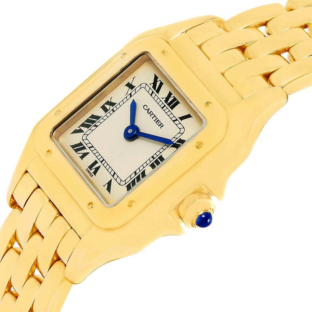 The image shows a close-up angle of a Cartier Panthère watch, highlighting the gold case, dial, and part of the bracelet.