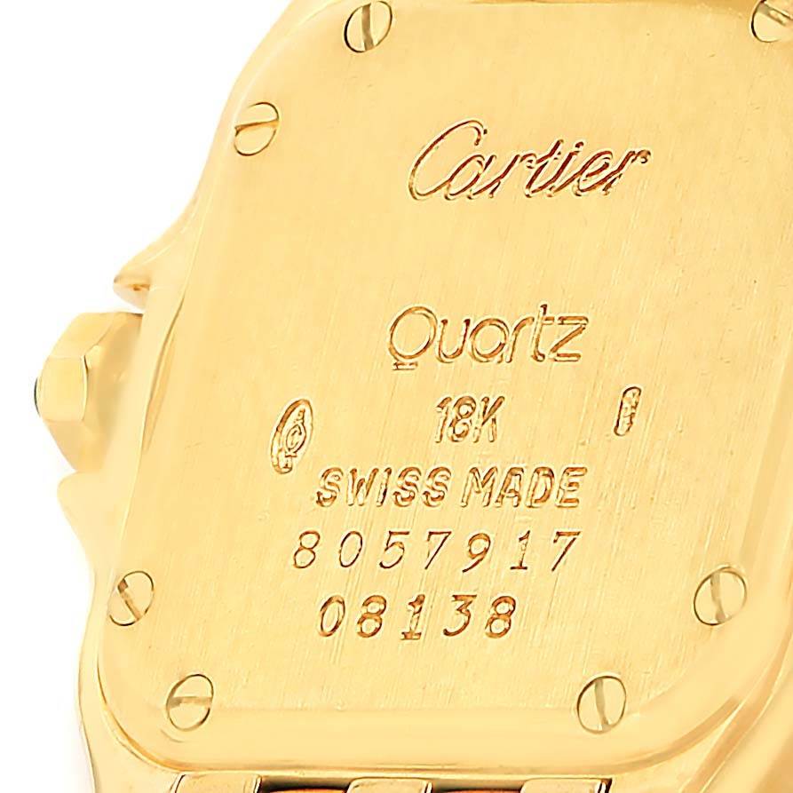 This image shows the back of a Cartier Panthere W25022B9 Women's Yellow Gold Beige Dial W25022B9 Women's Yellow Gold Beige Dial model watch, including details like "Quartz," "18K," and "Swiss Made."