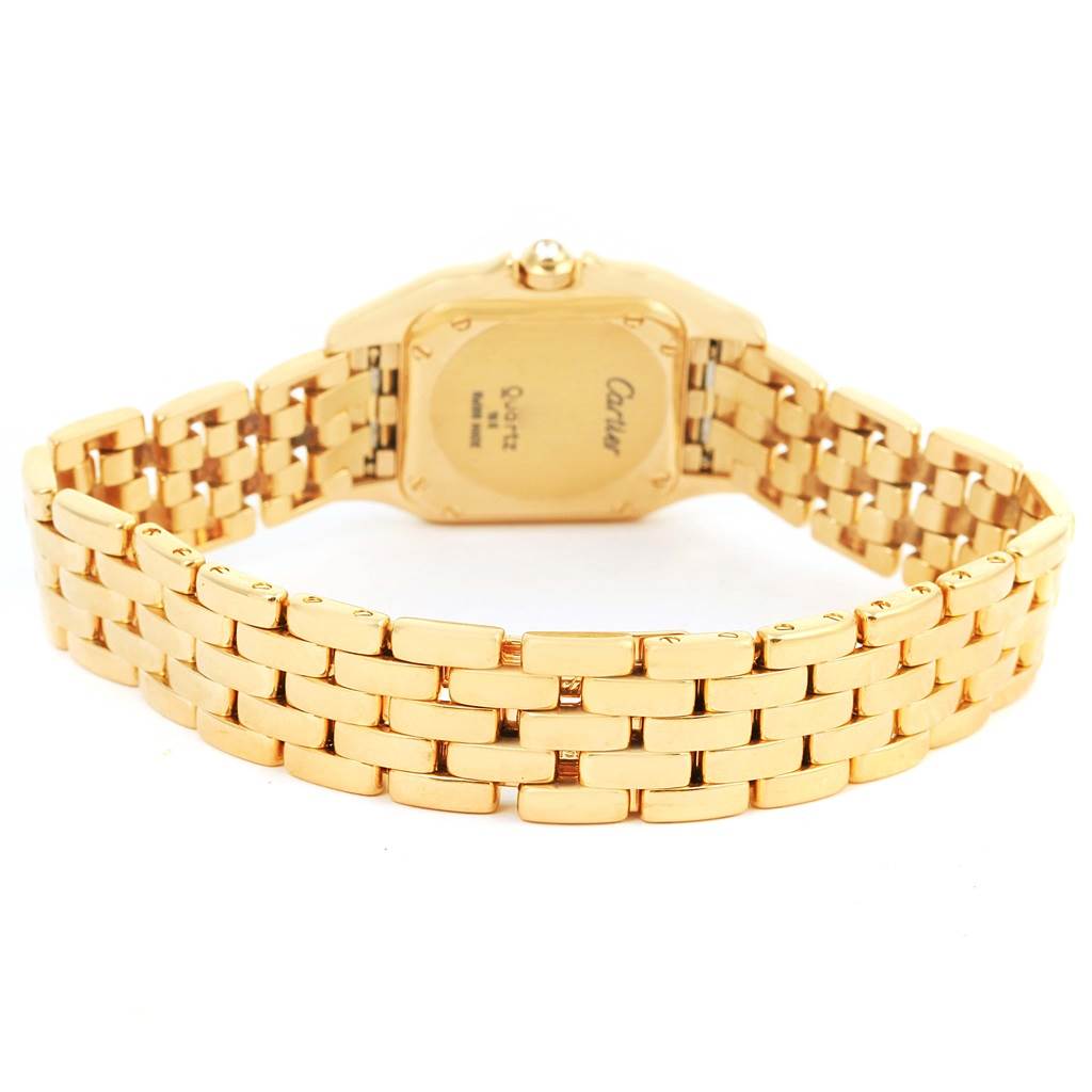 The image shows the back of a Cartier Panthere WF3070B9 Women's Yellow Gold Silver Dial WF3070B9 Women's Yellow Gold Silver Dial watch, highlighting its gold band and case back.