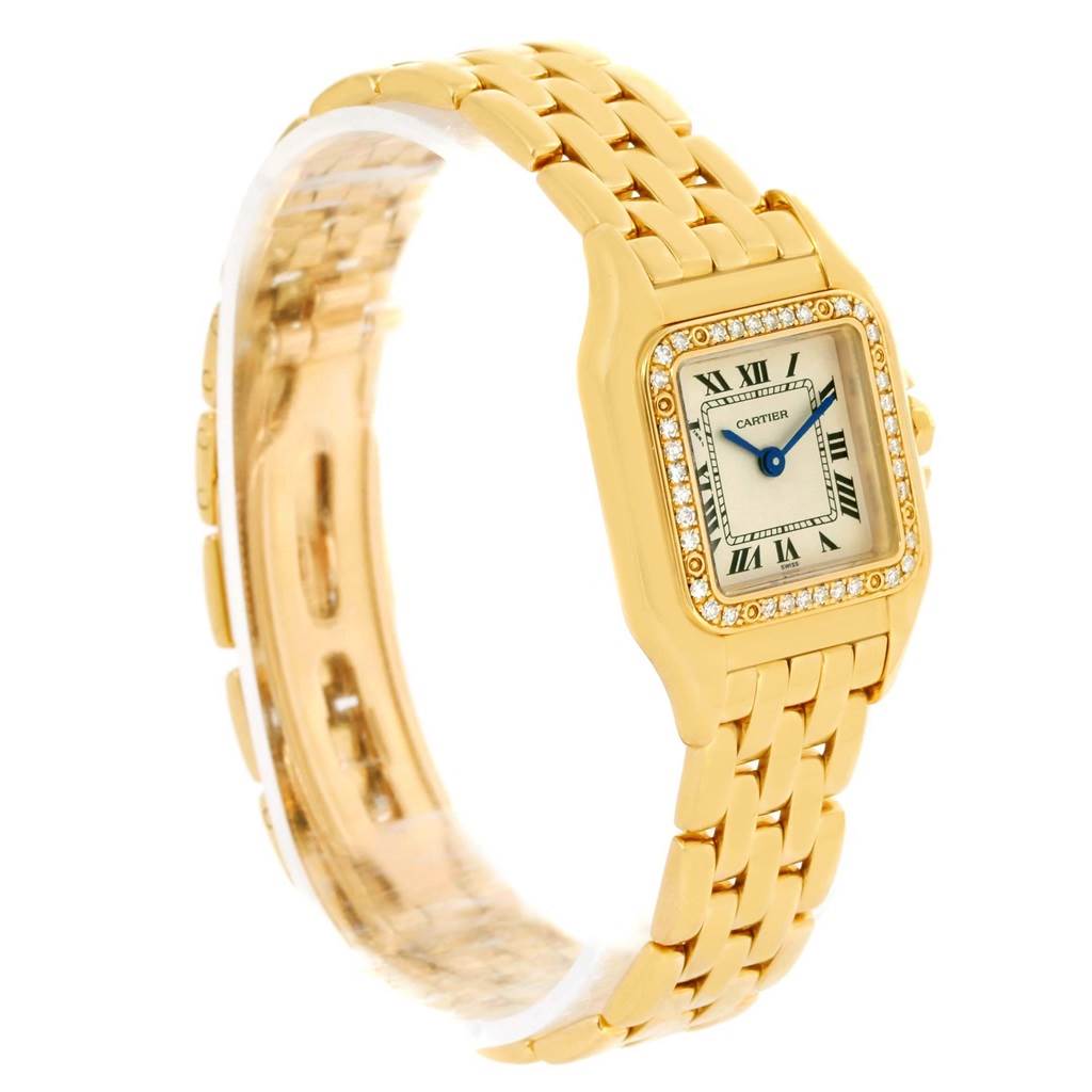 This image shows an angled view of the Panthère de Cartier watch, highlighting its gold case, diamond bezel, and bracelet.
