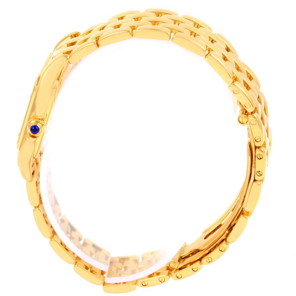 The image shows a side view of the gold bracelet of the Cartier Panthere W25022B9 Women's Yellow Gold Beige Dial W25022B9 Women's Yellow Gold Beige Dial watch, highlighting the blue cabochon on the crown.