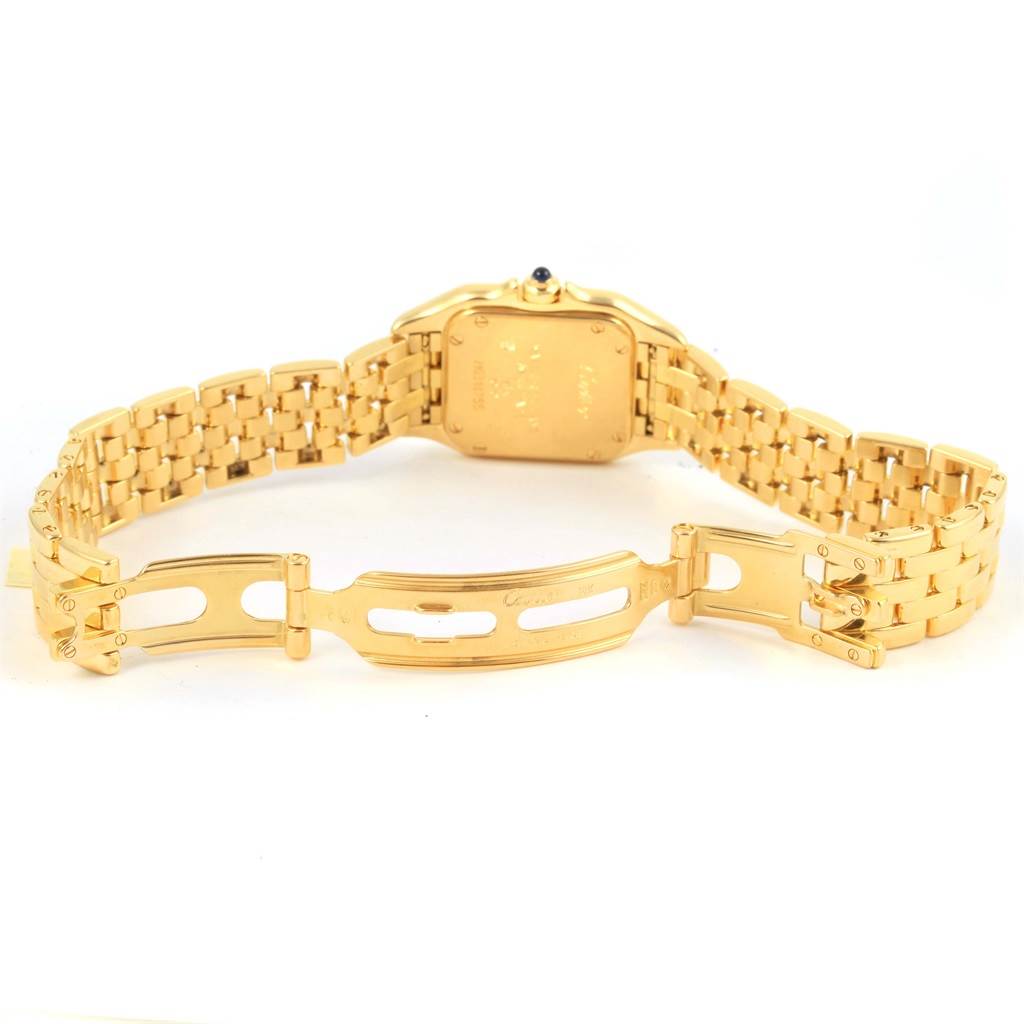 This image shows the back of a Cartier Panthere W25022B9 Women's Yellow Gold Beige Dial W25022B9 Women's Yellow Gold Beige Dial watch, focusing on the open bracelet and clasp mechanism.