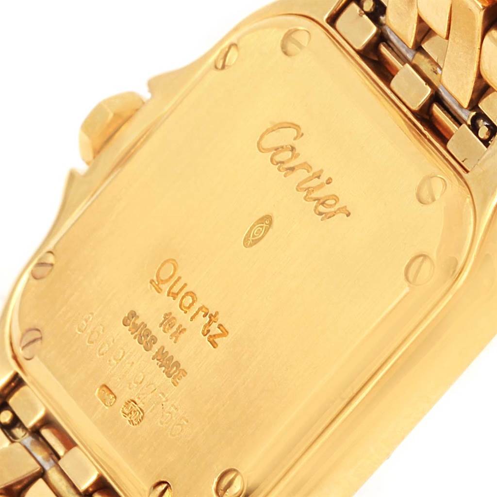 The image shows the back case and part of the bracelet of a Cartier Panthere WF3072B9 Women's Yellow Gold Silver Dial WF3072B9 Women's Yellow Gold Silver Dial watch.
