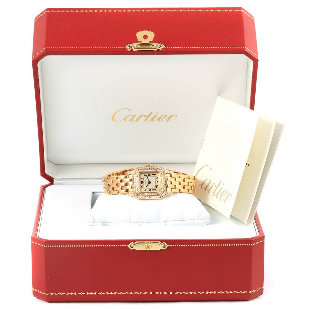 The Cartier Panthere WF3072B9 Women's Yellow Gold Silver Dial WF3072B9 Women's Yellow Gold Silver Dial watch is displayed front-on, inside its open red-and-white box with accompanying documentation.