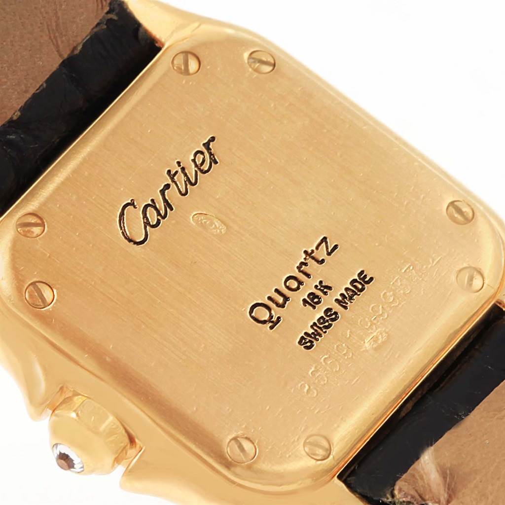 The image shows the back case of a Cartier Panthere WF3070B9 Women's Yellow Gold Silver Dial WF3070B9 Women's Yellow Gold Silver Dial watch in a close-up angle, highlighting the engraving details.