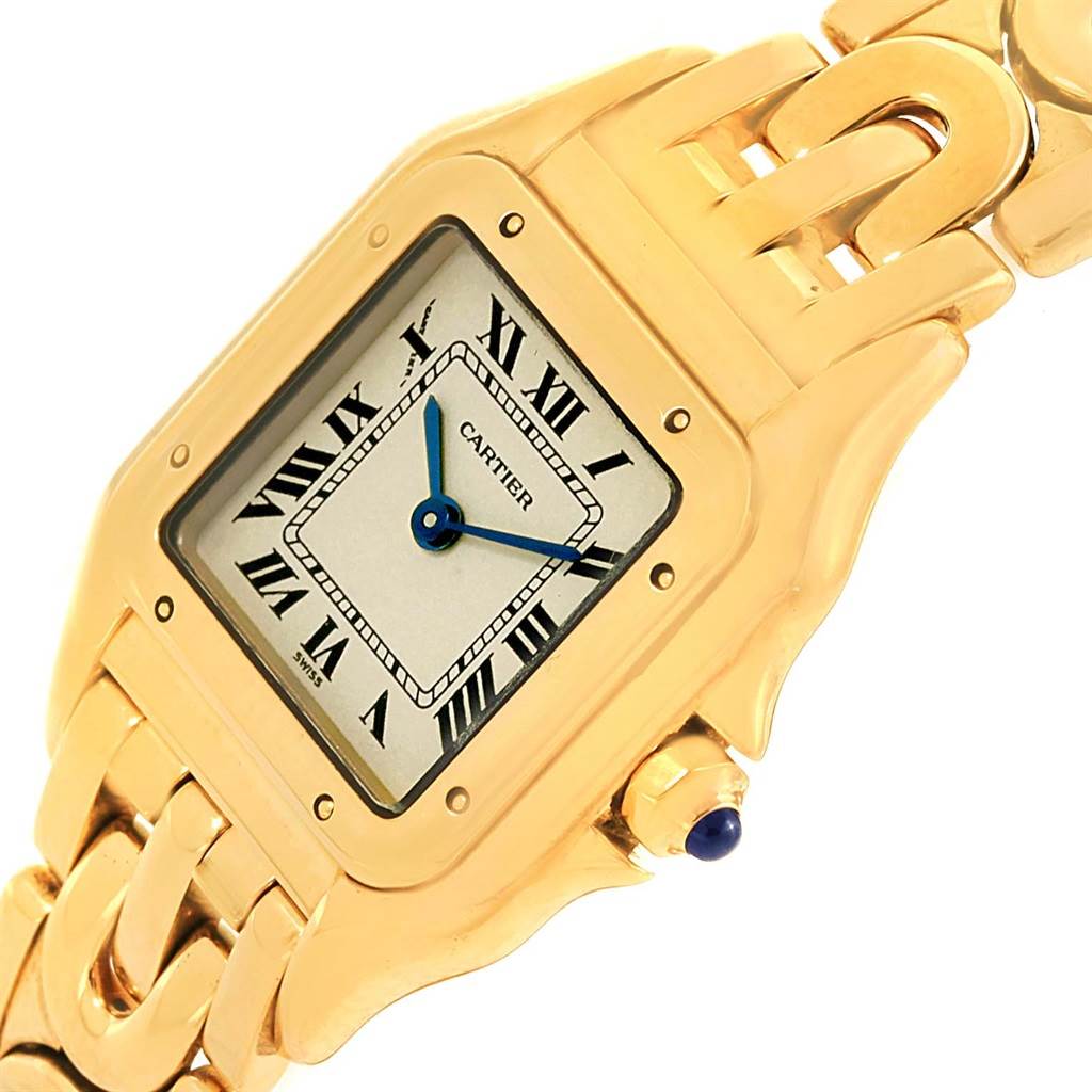 The image shows a close-up angle of the Cartier Panthere 1070 Women
s Yellow Gold Silver Dial 1070 Women
s Yellow Gold Silver Dial watch, highlighting the gold case, dial, and part of the bracelet.