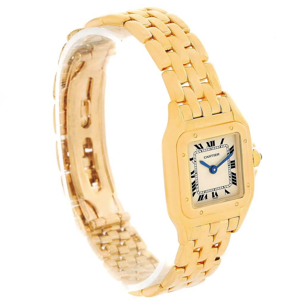 The image shows a Panthere de Cartier watch at an oblique angle, highlighting its gold case, bracelet, and Roman numeral dial.