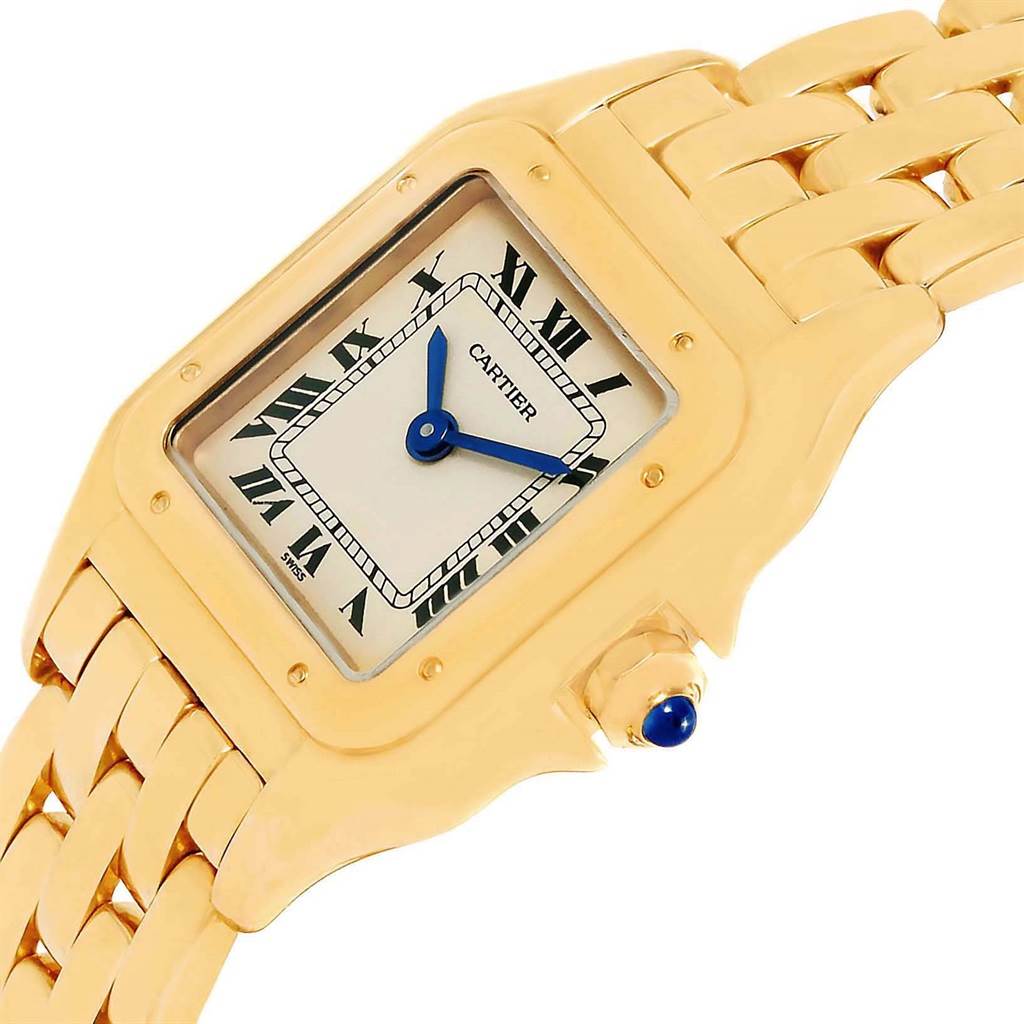 The image shows a close-up angle of a Cartier Panthere W25022B9 Women's Yellow Gold Beige Dial W25022B9 Women's Yellow Gold Beige Dial watch, highlighting the gold case, Roman numeral dial, blue hands, and part of the bracelet.