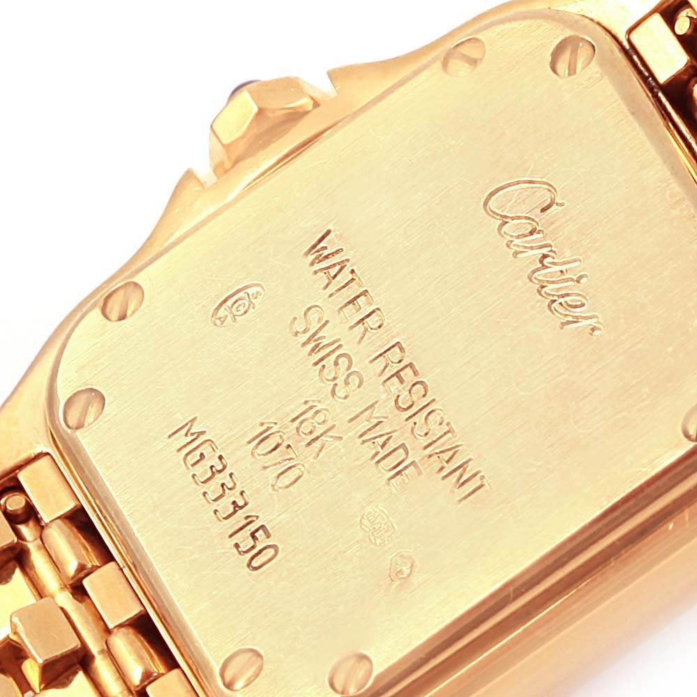 This image shows the back case of a Cartier Panthere W25022B9 Women's Yellow Gold Beige Dial W25022B9 Women's Yellow Gold Beige Dial watch, highlighting the engraving and markings.