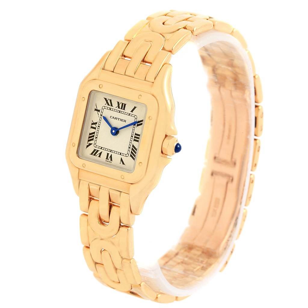 The image shows a Panthere de Cartier watch at a slightly tilted angle, displaying the face, bracelet, and crown.