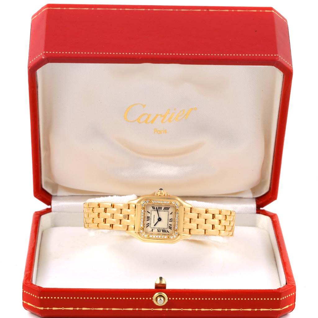 A Cartier Panthere WF3070B9 Women's Yellow Gold Silver Dial WF3070B9 Women's Yellow Gold Silver Dial model watch is shown from the front, placed inside an open red Cartier box.