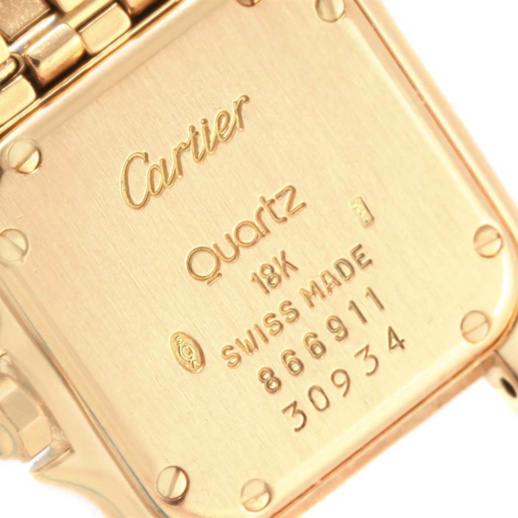This image shows the case back of a Cartier Panthere W25022B9 Women's Yellow Gold Beige Dial W25022B9 Women's Yellow Gold Beige Dial Quartz watch, highlighting the engravings and serial numbers.