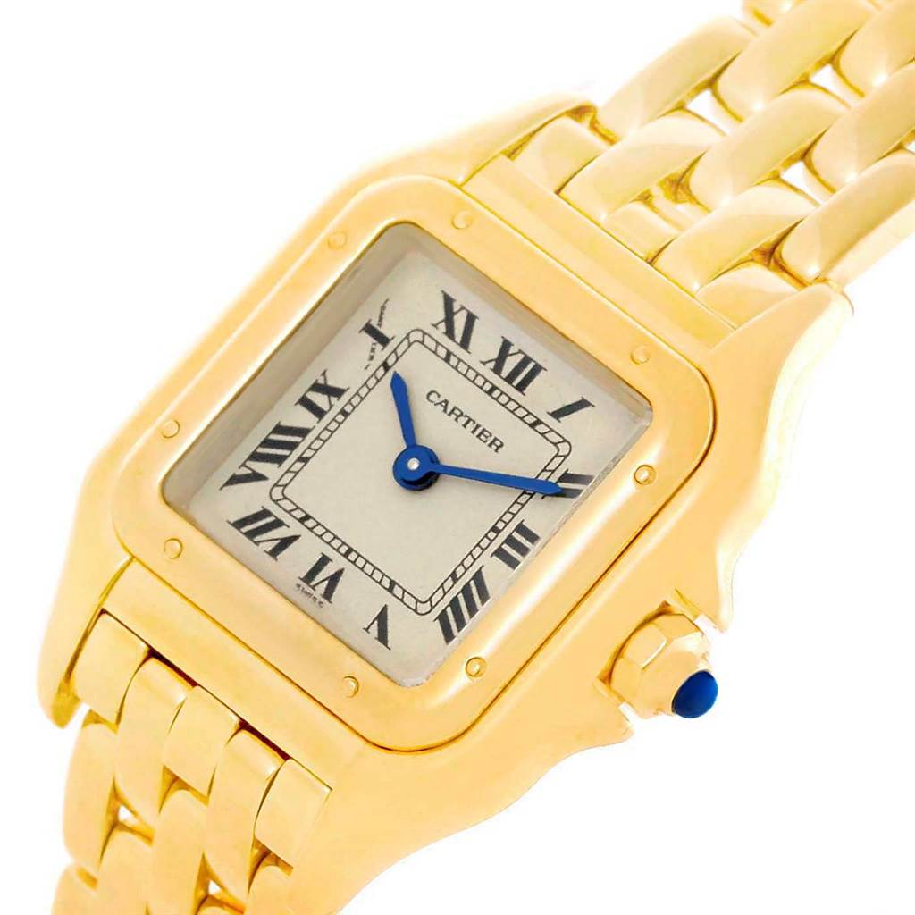 The image shows a close-up angle of the Panthere model by Cartier, highlighting the face, bezel, part of the bracelet, and crown.