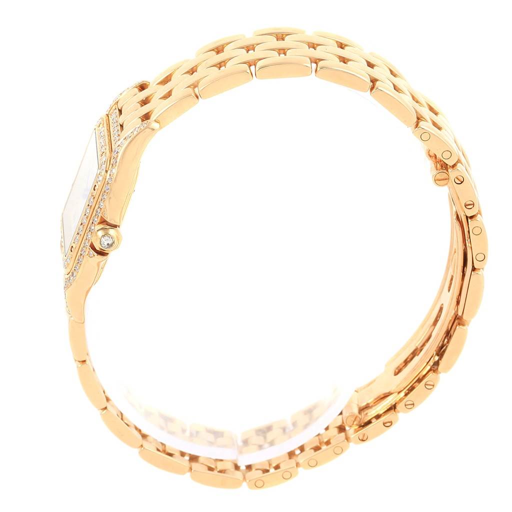 This image shows a side view of the Cartier Panthere WF3072B9 Women
s Yellow Gold Silver Dial WF3072B9 Women
s Yellow Gold Silver Dial watch, highlighting the bracelet and watch crown.