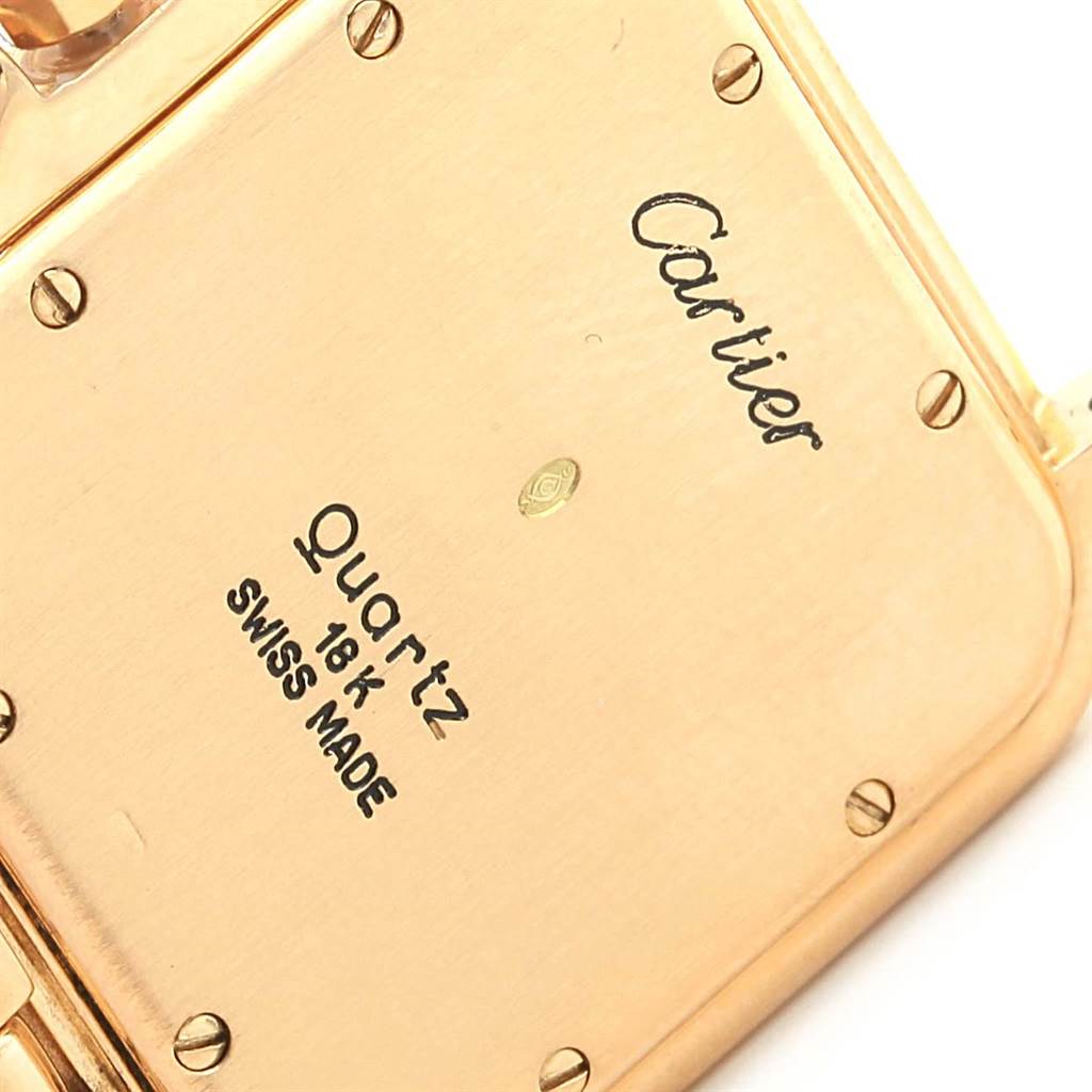 This image shows the engraved back of a Cartier Panthere W25014B9 Men's Yellow Gold Silver Dial W25014B9 Men's Yellow Gold Silver Dial Quartz watch, detailing the brand, model, material, and origin.