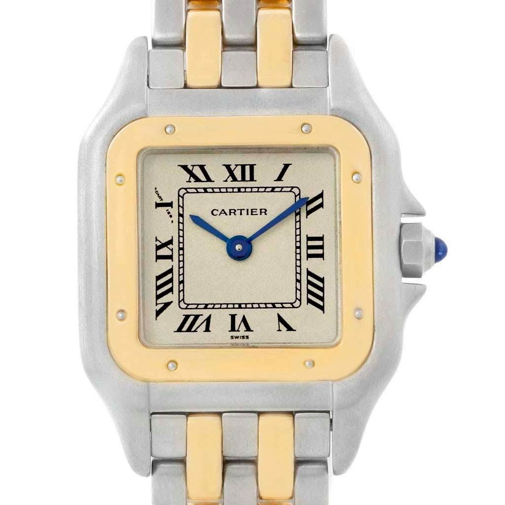 The image shows a front view of the Cartier Panthere W25029B6 Women
s Stainless Steel Silver Dial W25029B6 Women
s Stainless Steel Silver Dial watch, displaying its square face, Roman numerals, two-tone bracelet, and blue cabochon crown.