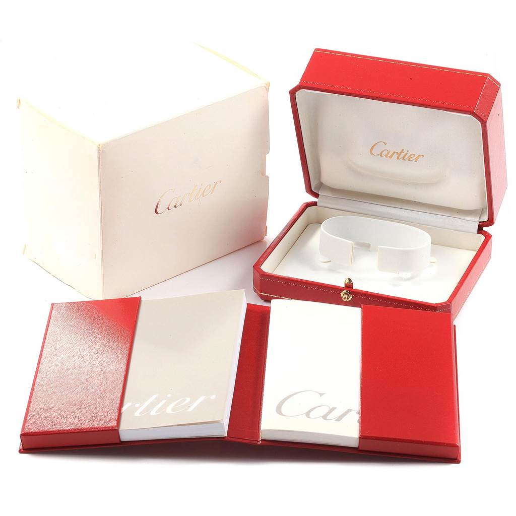 The image shows the packaging and accessories for a Cartier Panthere 86691 Women's Yellow Gold Mother of Pearl Dial 86691 Women's Yellow Gold Mother of Pearl Dial watch, including the box and booklets, from a front angle.