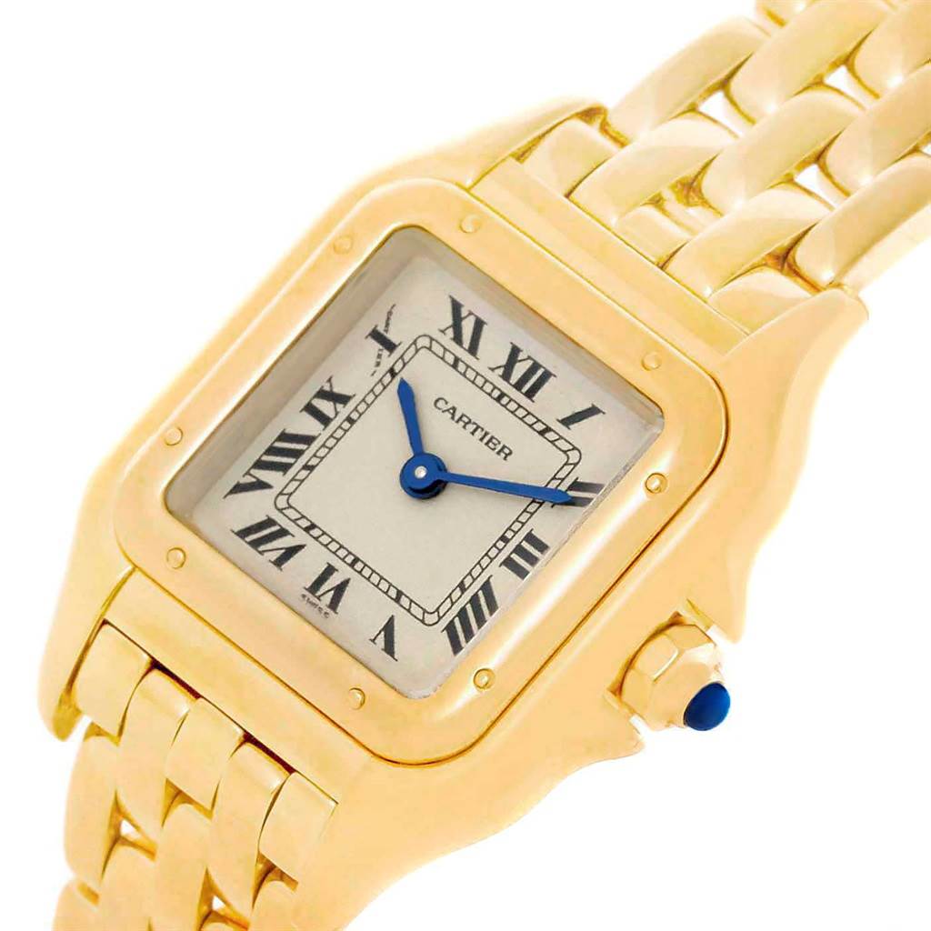 The image shows a close-up of the dial, case, and part of the bracelet of a Panthere by Cartier watch.