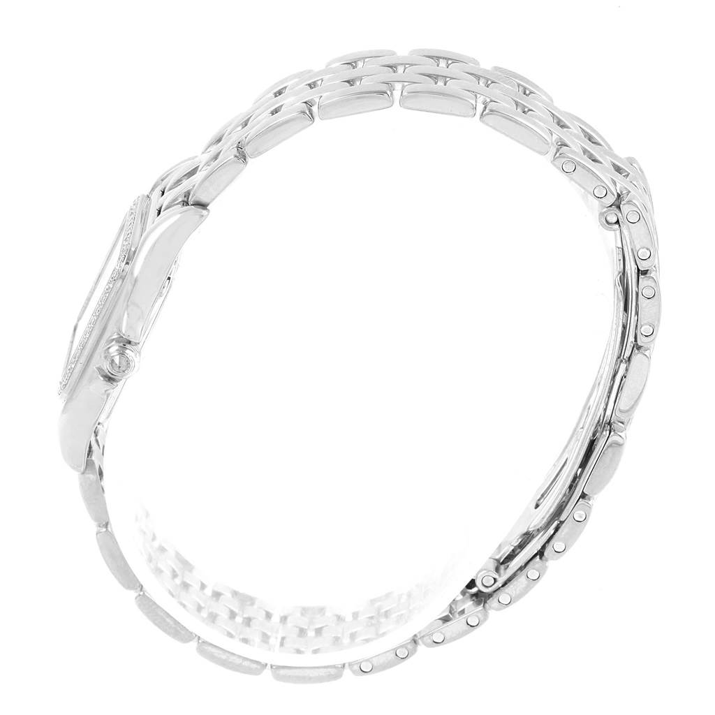 The Cartier Panthere WF3091F3 Women
s White Gold Silver Dial WF3091F3 Women
s White Gold Silver Dial watch is shown from a side angle, highlighting its bracelet band and case.