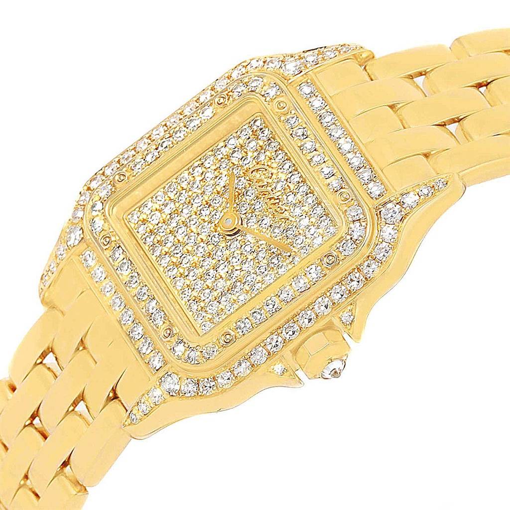 The Cartier Panthere Women's Yellow Gold Champagne Dial Women's Yellow Gold Champagne Dial watch is shown from an angled view, highlighting its gem-encrusted bezel, case, face, and linked bracelet.