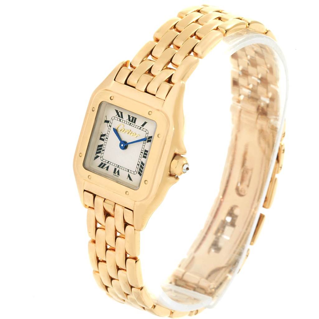 The image shows a Cartier Panthere W25022B9 Women's Yellow Gold Silver Dial W25022B9 Women's Yellow Gold Silver Dial watch at a three-quarter angle, displaying its face, bezel, and gold bracelet.
