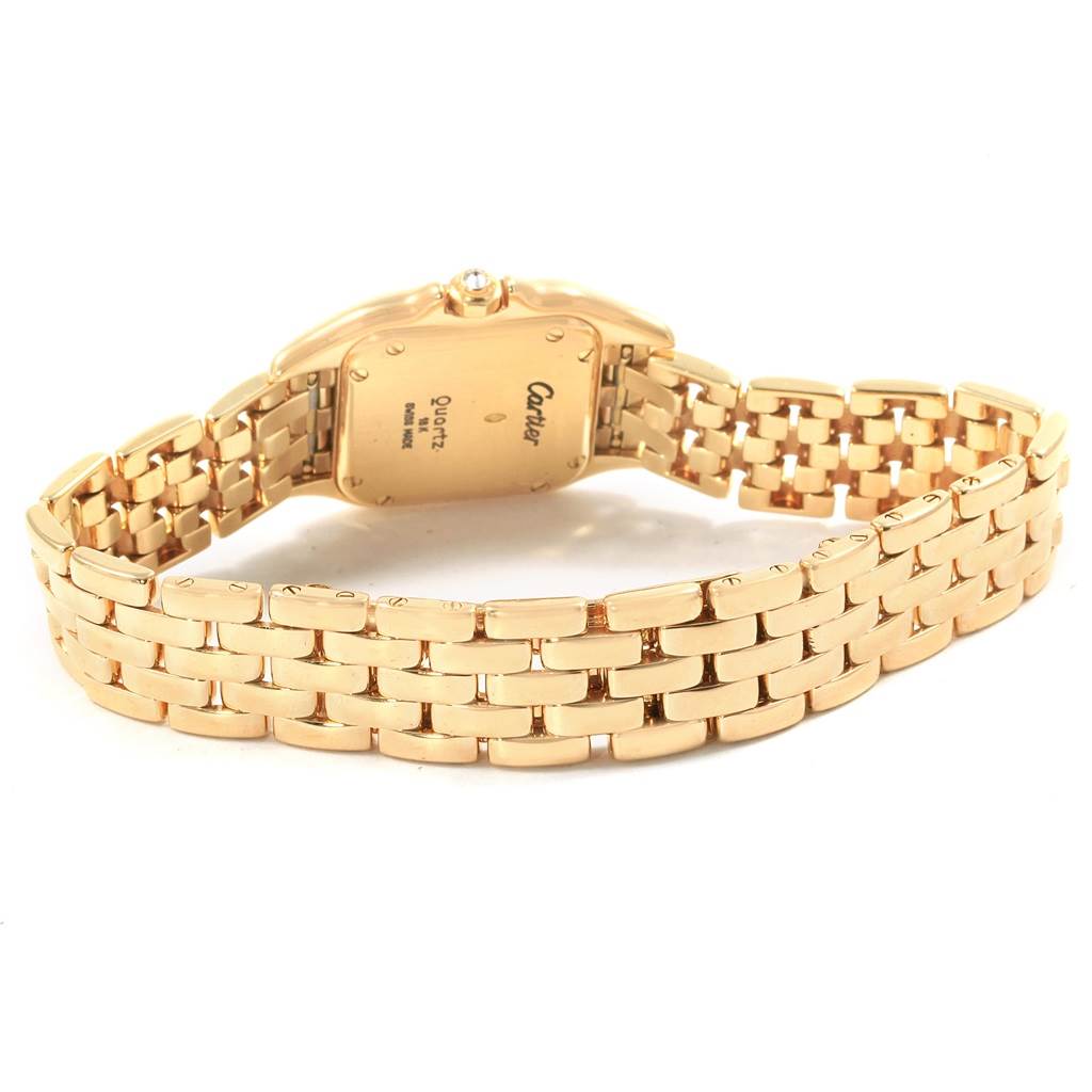 The image shows the back view of the gold bracelet and case of a Cartier Panthere W25022B9 Women's Yellow Gold Silver Dial W25022B9 Women's Yellow Gold Silver Dial watch.