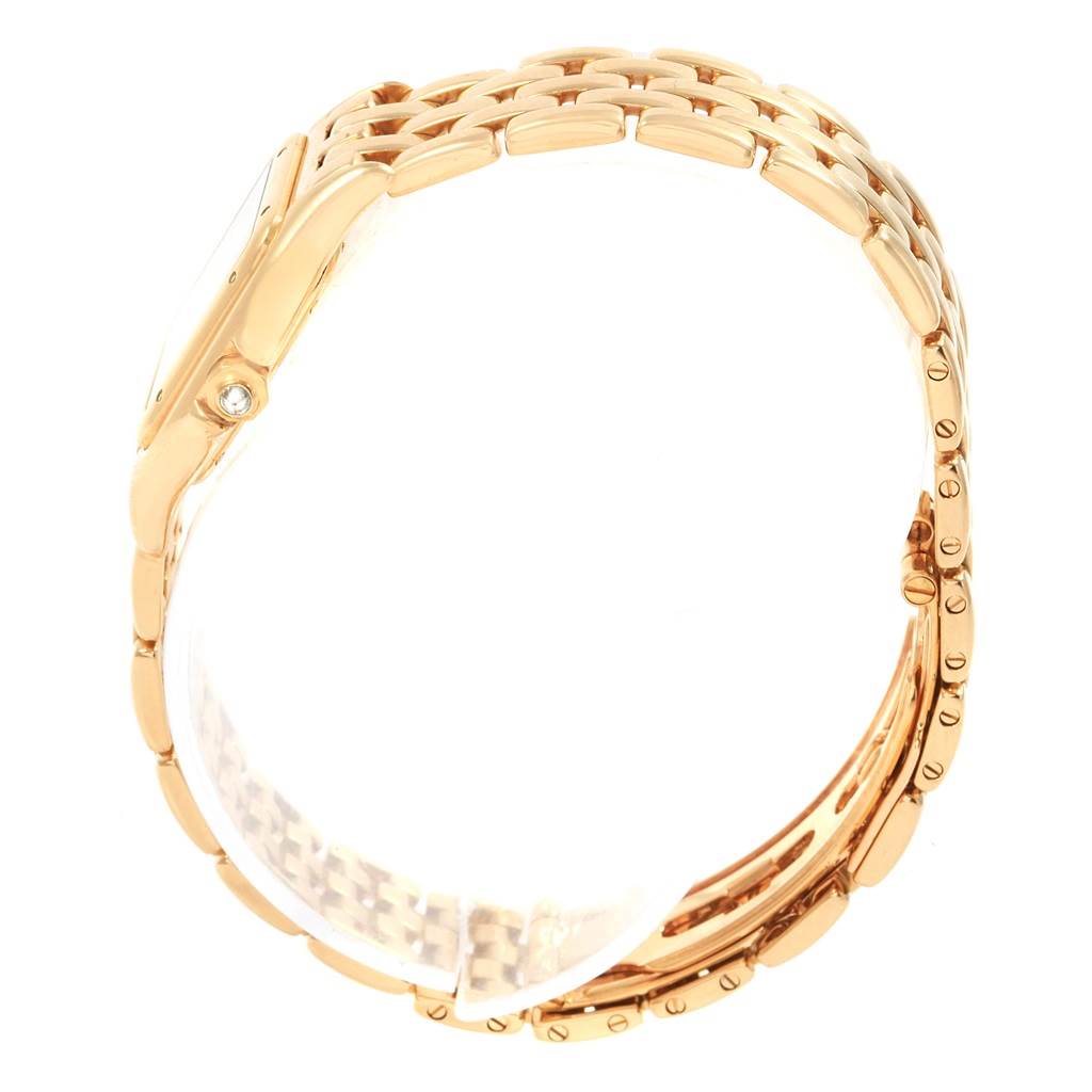 The image shows a side view of a Cartier Panthere W25022B9 Women's Yellow Gold Silver Dial W25022B9 Women's Yellow Gold Silver Dial watch, highlighting its gold bracelet and clasp.