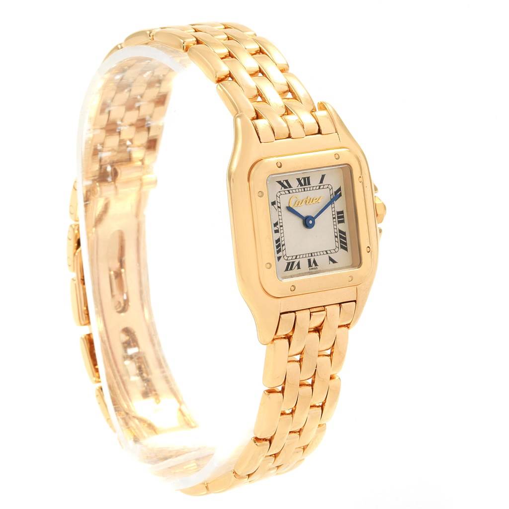 This image shows a Panthere model by Cartier at an angle highlighting the gold case, bracelet, and Roman numeral dial.