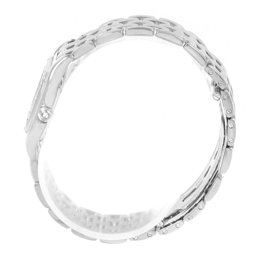 This image shows a side view of the Cartier Panthere WF3091F3 Women
s White Gold Silver Dial WF3091F3 Women
s White Gold Silver Dial watch, highlighting its metal band and profile.