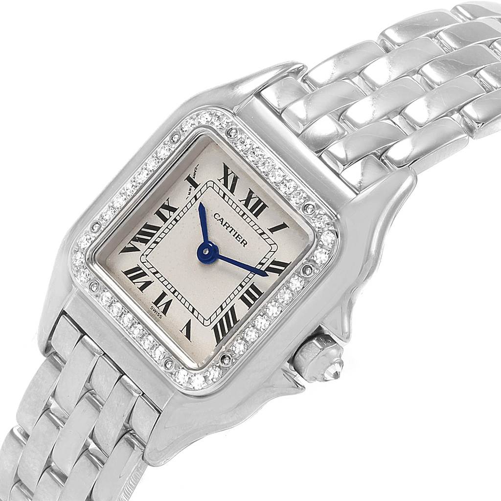 This is a close-up angle of a Cartier Panthere WF3091F3 Women
s White Gold Silver Dial WF3091F3 Women
s White Gold Silver Dial watch, showing its dial, bezel, and part of the bracelet.