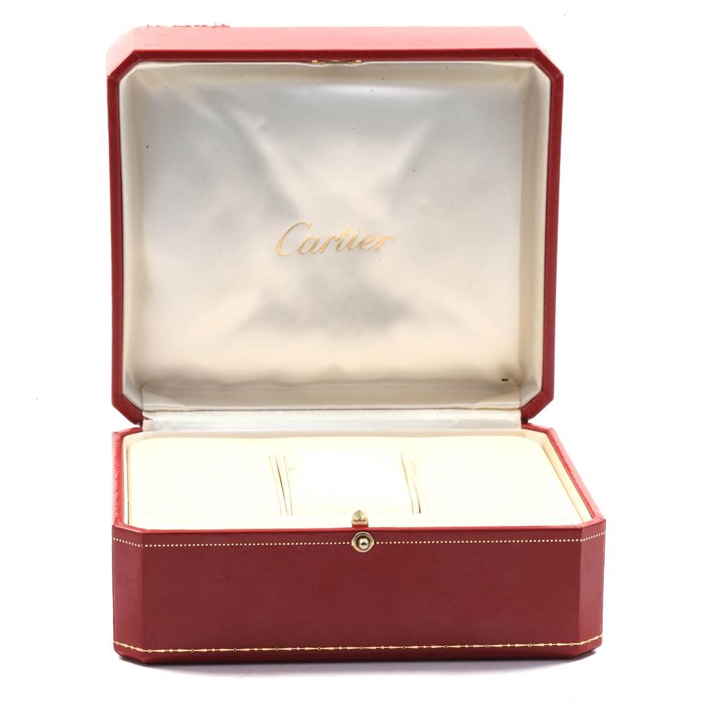 This image shows an open Cartier Panthere WF3072B9 Women's Yellow Gold Silver Dial WF3072B9 Women's Yellow Gold Silver Dial watch box with the brand name inside the lid.