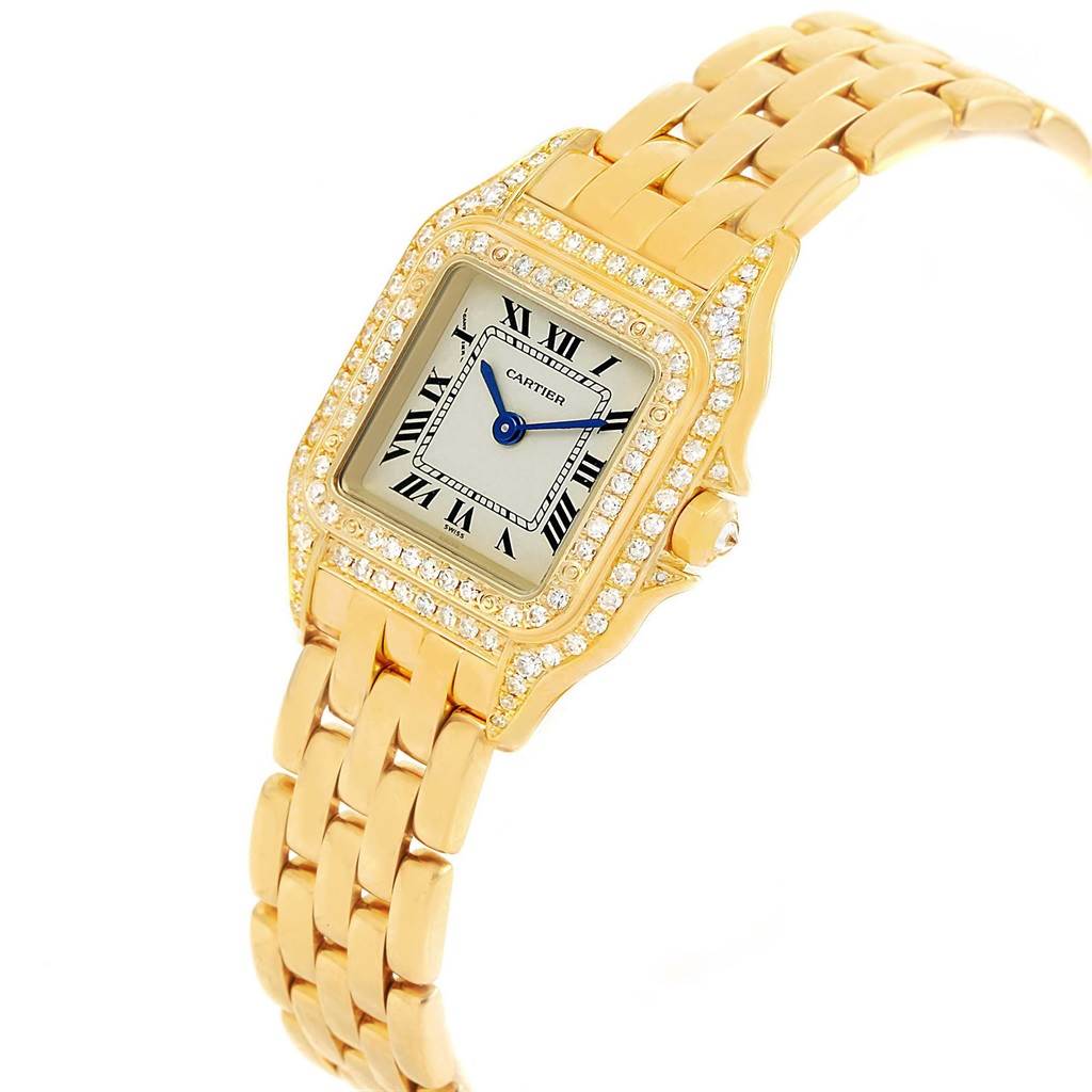 The image shows a Cartier Panthere WF3072B9 Women's Yellow Gold Silver Dial WF3072B9 Women's Yellow Gold Silver Dial watch from a side angle, highlighting its gold bracelet, diamond bezel, and Roman numeral dial.