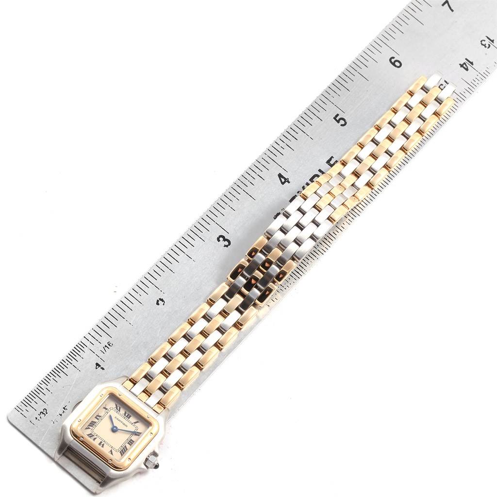 The Panthere model by Cartier is shown from the front, including the face, bezel, and the full band with a ruler for scale.