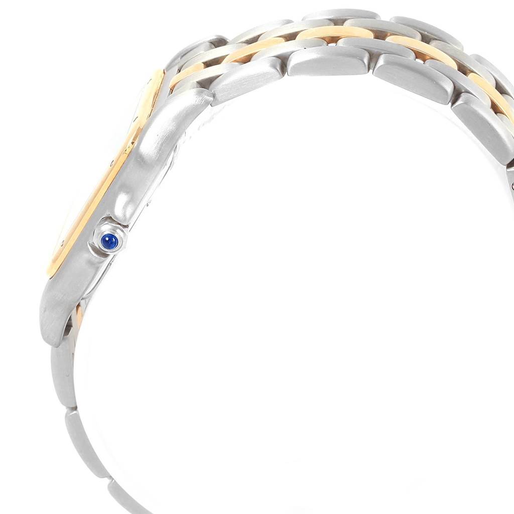 The side view of the Cartier Panthere W25028B5 Men's Steel and Gold (two tone) Silver Dial W25028B5 Men's Steel and Gold (two tone) Silver Dial watch showcases its bracelet and crown with a blue gem.