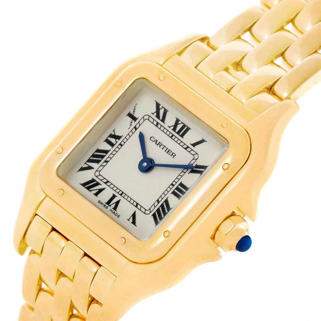 The image shows a close-up of the Cartier Panthere W25022B9 Women's Yellow Gold Silver Dial W25022B9 Women's Yellow Gold Silver Dial watch, highlighting its gold case, bracelet, and Roman numeral dial.