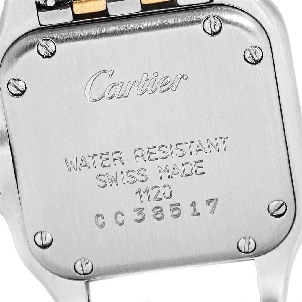 This image shows the back casing of the Cartier Panthere W25028B8 Steel and Gold (two tone) Beige Dial W25028B8 Steel and Gold (two tone) Beige Dial watch at a close-up angle displaying the brand name, water resistance, and serial number.