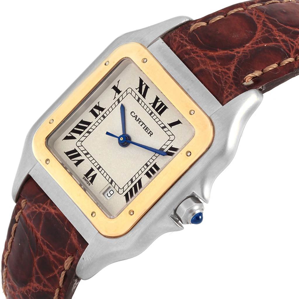 The image shows a close-up of the Cartier Panthere W25028B5 Men
s Steel and Gold (two tone) Silver Dial W25028B5 Men
s Steel and Gold (two tone) Silver Dial watch face, bezel, crown, and leather strap, taken from a slight angle.