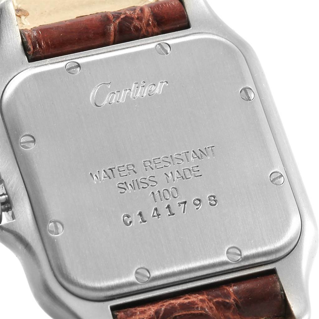 The image shows the back cover and part of the leather strap of the Panthere model by Cartier.