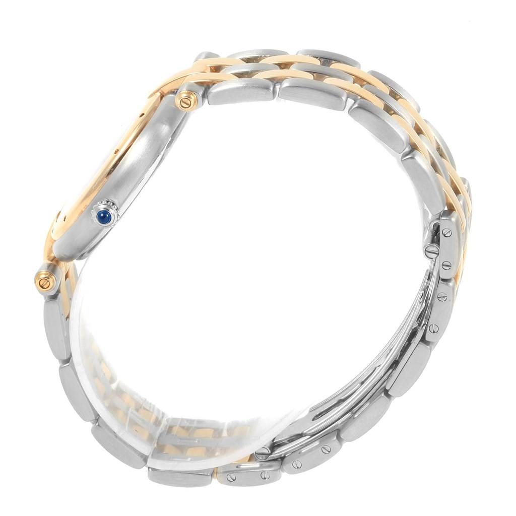 The image shows a side view of the Panthere model by Cartier, highlighting its link bracelet and crown with a blue cabochon.