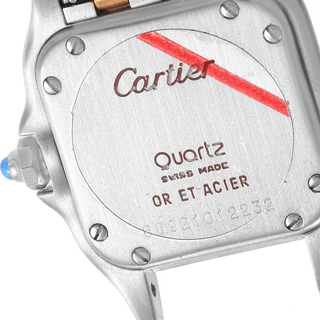 The image shows the back case of a Cartier Panthere W25029B6 Women
s Stainless Steel Silver Dial W25029B6 Women
s Stainless Steel Silver Dial watch, highlighting the brand name, model details, and screws.