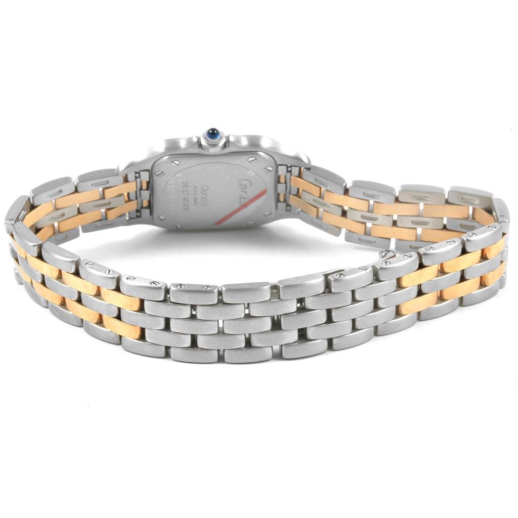 The image shows the back view of a Cartier Panthere W25029B6 Women
s Stainless Steel Silver Dial W25029B6 Women
s Stainless Steel Silver Dial watch, focusing on its two-tone metal bracelet and case back with an engraving.