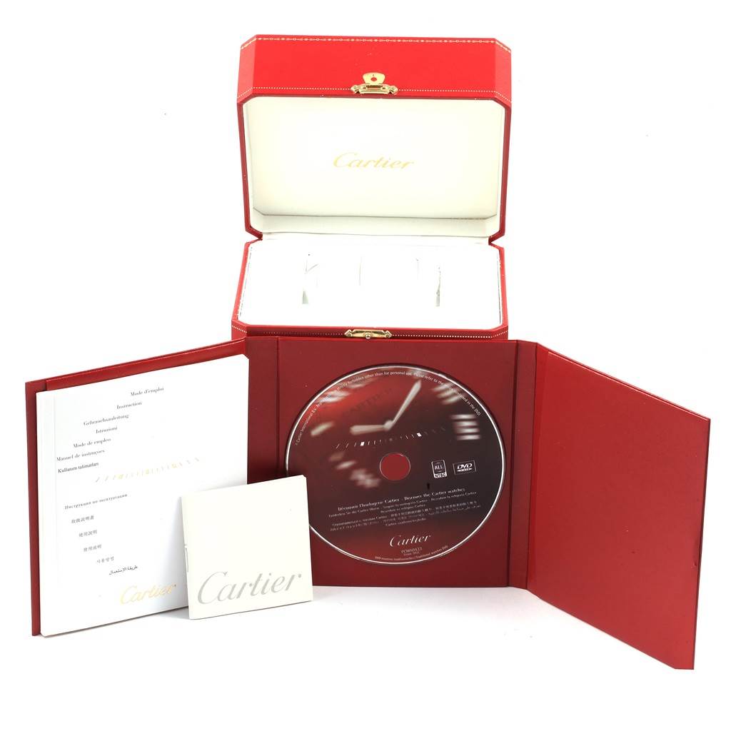The image shows the packaging, manuals, and CD for the Cartier Panthere 887907 Yellow Gold Silver Dial 887907 Yellow Gold Silver Dial model watch.